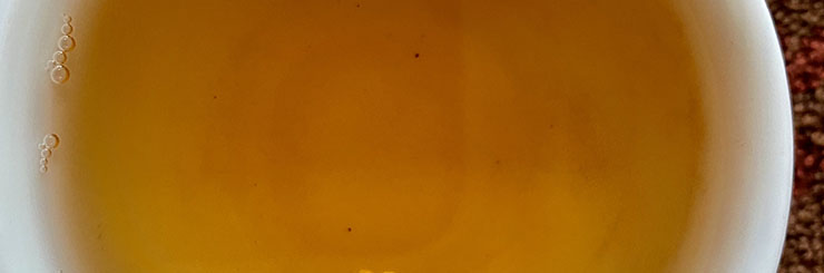 Charcoal roasted high mountain oolong tea brewed in cup