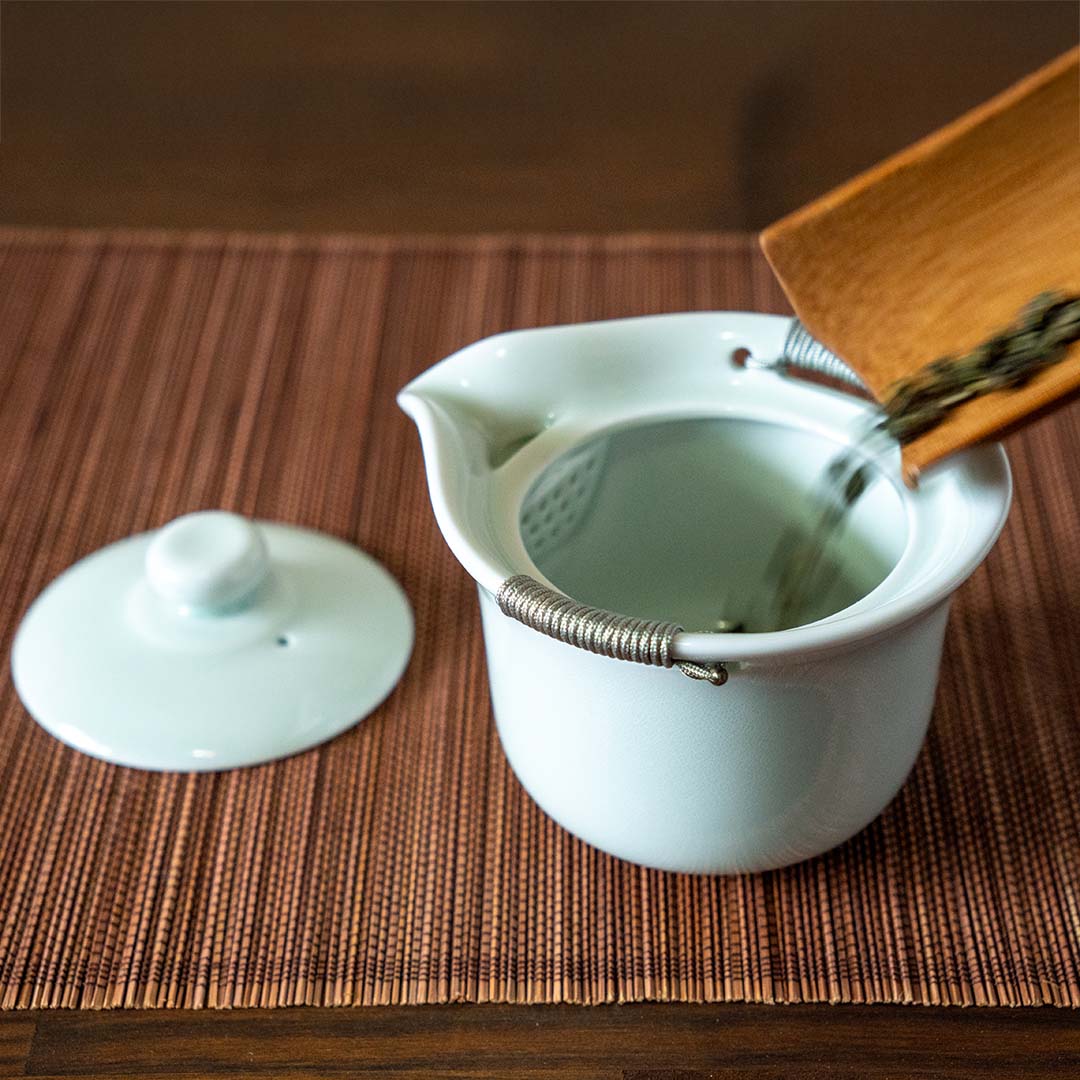 Gaiwan Pitcher with Handles with tea leaves going inside