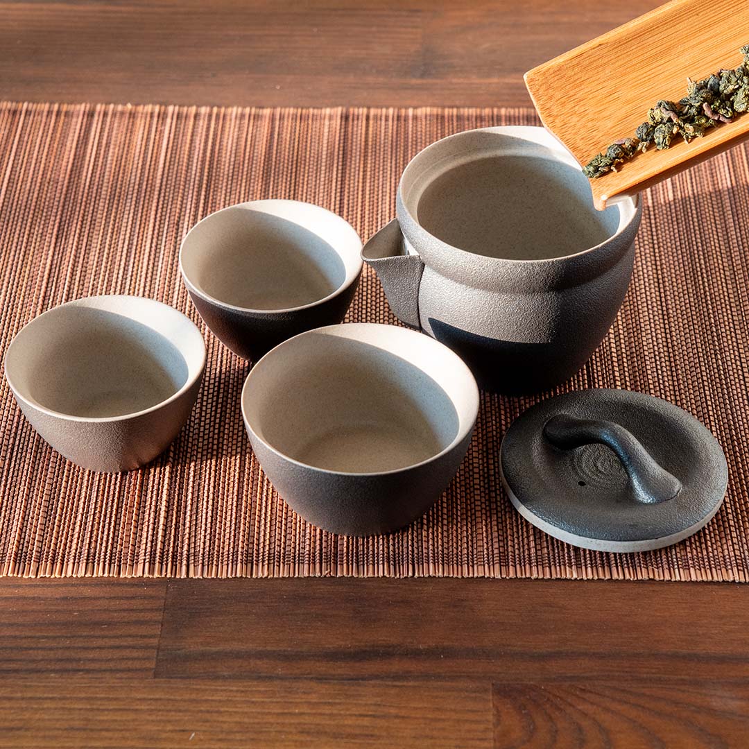 Travel Tea Set Black Tea Leaves Going In