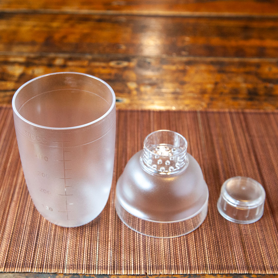 Cocktail shaker comes with main cup, lid, and cap