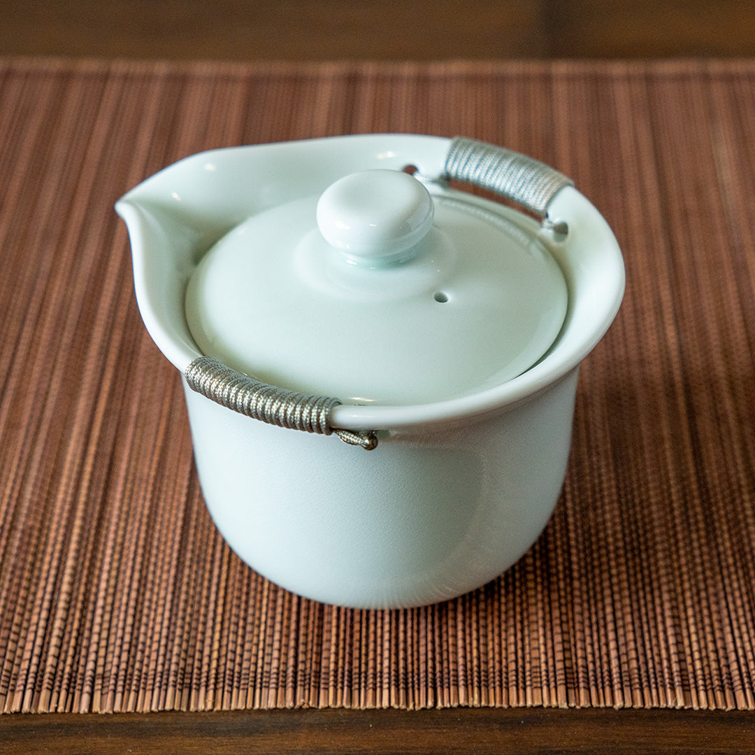 Gaiwan Pitcher with Handles on wooden table