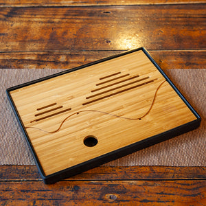 Bamboo tea tray on wooden table