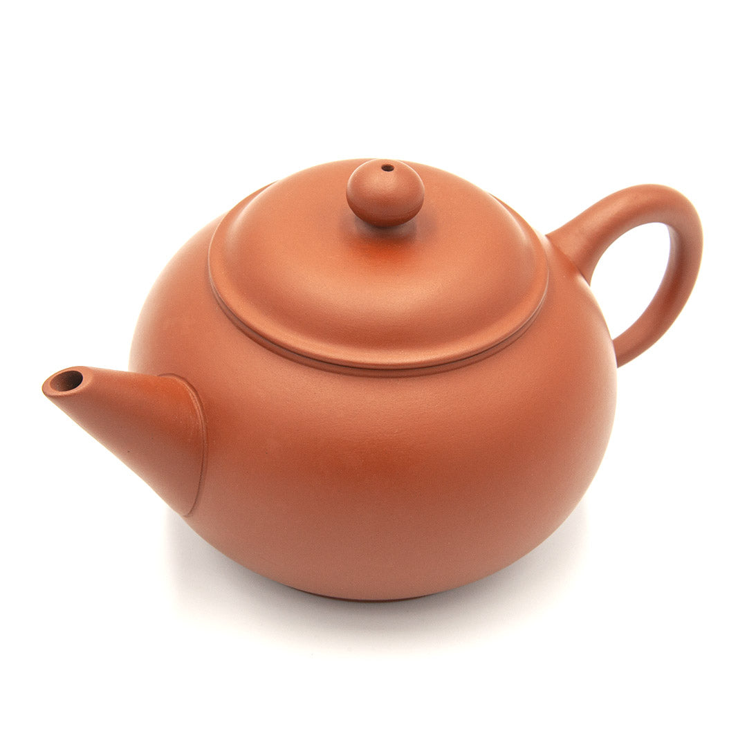 Clay teapot, three-quarter view