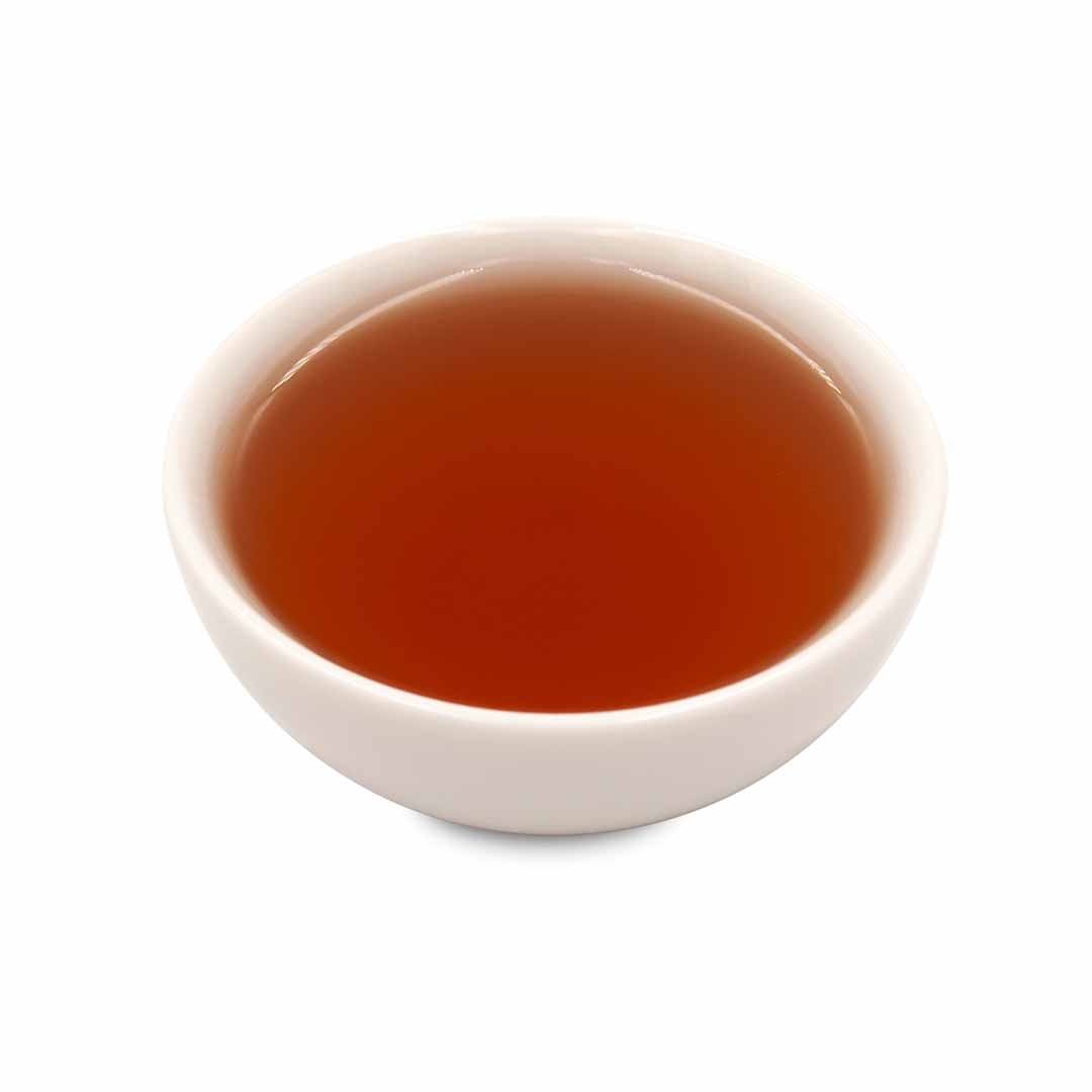 Hong Oolong Tea brewed in a teacup