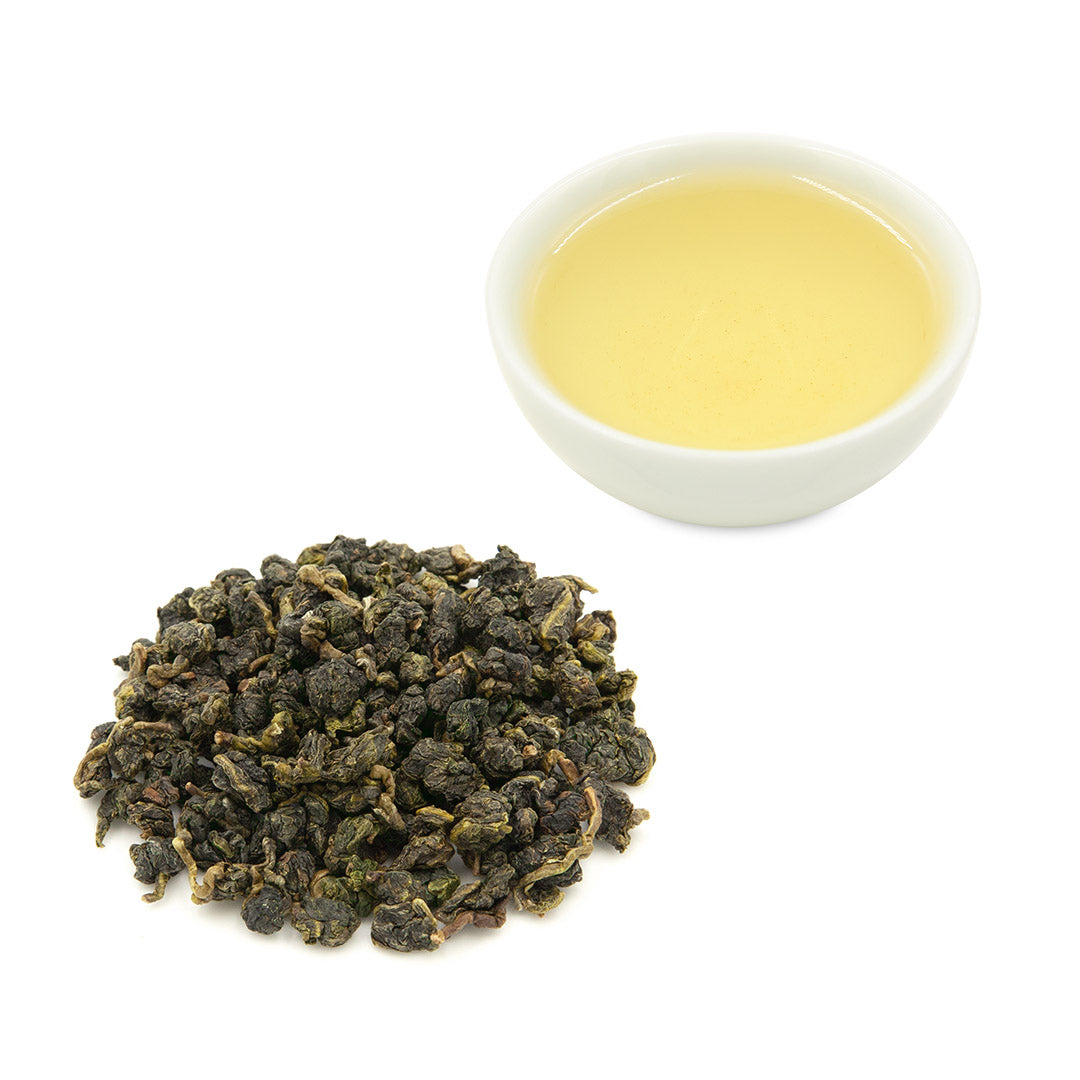 Jin Xuan Oolong brewed tea and dried leaves