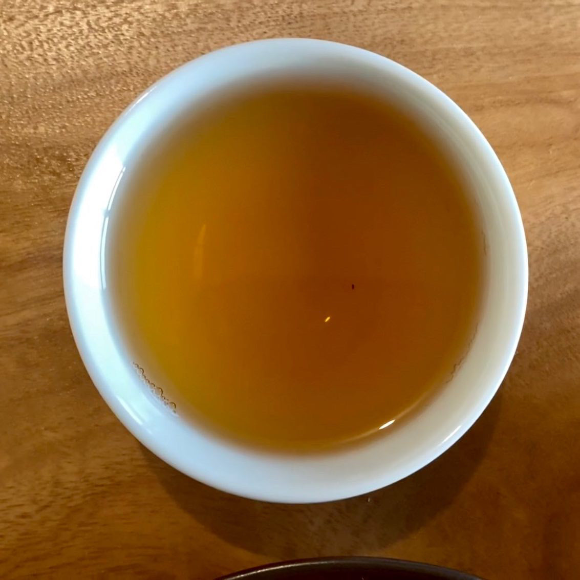 Taiwan Lugu Competition Dong Ding Oolong Tea brewed in a cup