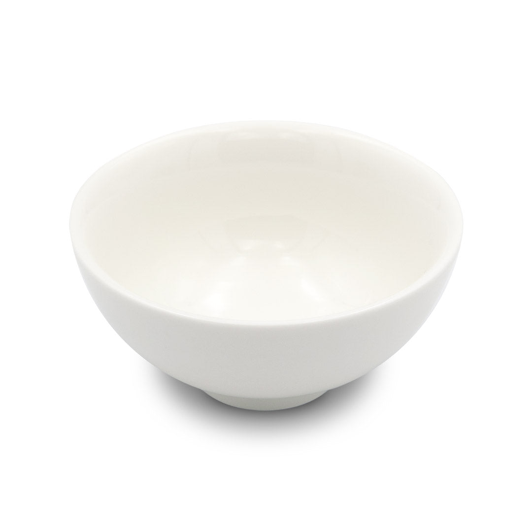 White porcelain tea cup on white background