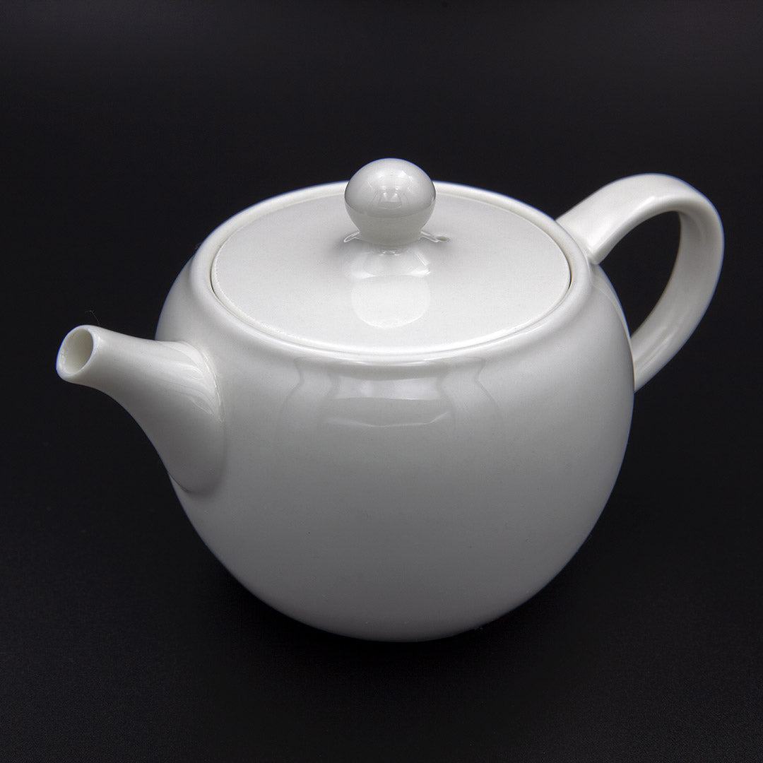https://eco-cha.com/cdn/shop/products/White_Porcelain_Teapot_Blk_Bkgrd_1080x1080.jpg?v=1658636640